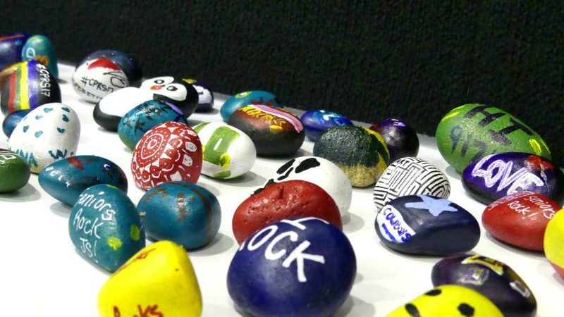 Paint a rock with an uplifting message and leave for someone to find