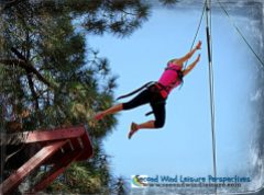Pink-clad student at Ropes Course